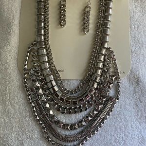 Sliver multi layered necklace.